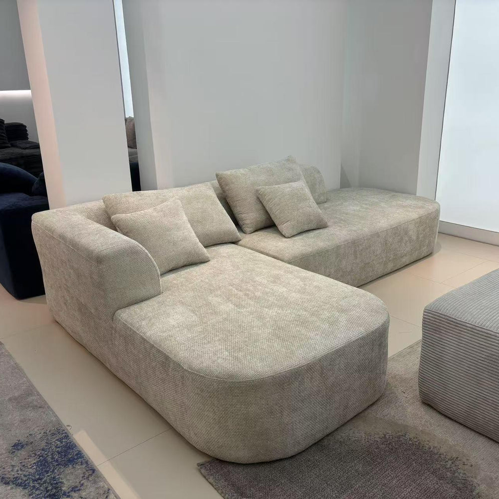 Premium L-shaped sectional sofa– Minimalist Upholstery with Soft Curves & Low Profile Design